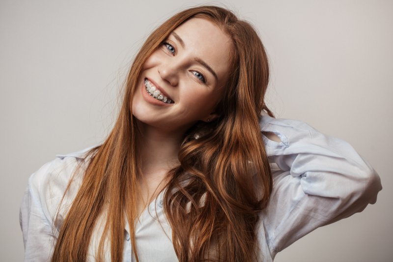 Lady with braces smiles